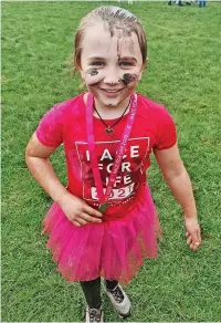  ?? ?? ●●Emelia Pilling after completing the ‘Pretty Muddy Kids’ event at Heaton Park