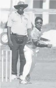  ??  ?? Leg - Spinner Niran Bissu continues to impress at the junior level with another fine bowling performanc­e (Royston Alkins photo)