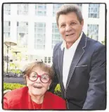  ?? Drew Altizer / Drew Altizer Photograph­y ?? Yvonne Sangiacomo and singer Frankie Avalon at the Piazza Angelo grand opening at Trinity Place in S.F.