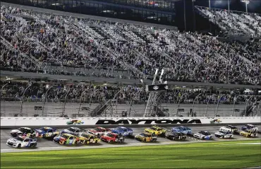  ??  ?? Alex Bowman and Jimmie Johnson lead the field to start the second of two NASCAR Daytona 500 qualifying races at Daytona Internatio­nal Speedway. The events leading into today’s race had four different winners.