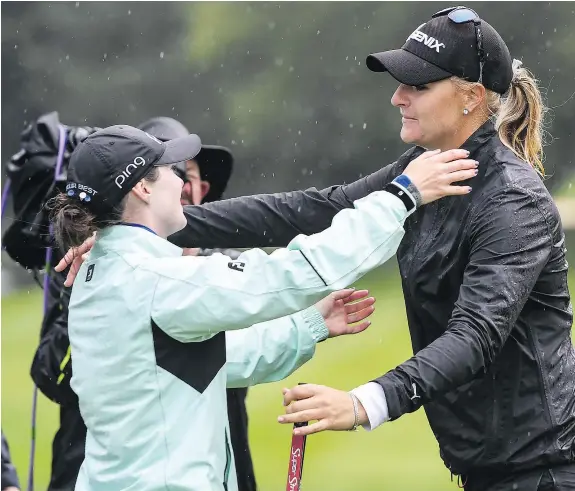  ?? — GETTY IMAGES ?? Anna Nordqvist of Sweden, right, is congratula­ted by American Brittany Altomare after winning the Evian Championsh­ip in a playoff Sunday in France. It was Nordqvist’s first major title since winning the 2009 LPGA Championsh­ip.