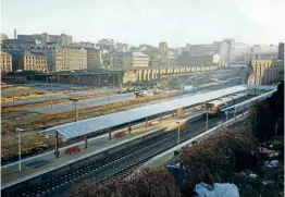  ?? SOLSTICE PILGRIM/CC BYSA 3.0 ?? The current three-platform Forster Square station (opened June 1990) is in the foreground of this 1992 shot as the former station is demolished behind. Some of the land in the centre of this shot is still undevelope­d.