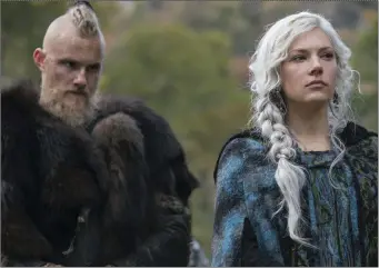  ??  ?? Ragnar Lothbrok (Travis Fimmel) and Lagertha (Katheryn Winnick) from the original series of ‘Vikings’.