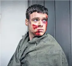  ??  ?? Tense: David Budd, played by Richard Madden, found himself wrapped in explosives