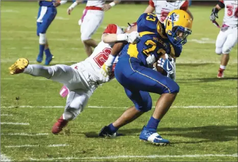  ?? SERGIO BASTIDAS PHOTO ?? Brawley Union High’s Michael Moreno attempts to shake off an Imperial High defender during the 10th Game of the Week of the season at Warne Field on Friday night.