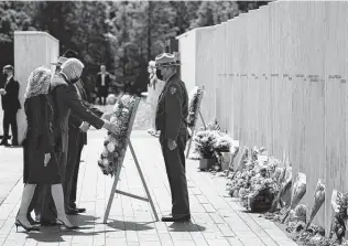  ?? Evan Vucci / Associated Press ?? President Joe Biden and first lady Jill Biden lay a wreath during a visit to the Flight 93 National Memorial in Shanksvill­e, Pa. They also attended ceremonies in New York and Washington, D.C.