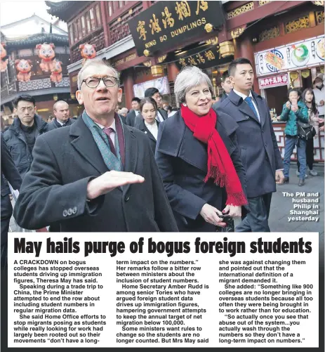  ?? Picture: CHRIS RATCLIFFE / EPA ?? The PM and husband Philip in Shanghai yesterday