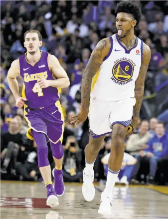  ?? Scott Strazzante / The Chronicle ?? Nick Young, in a rare start, was scoreless in the first half but finished with 18 points.