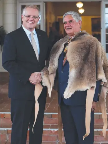  ?? Picture: KYM SMYTH ?? Ken Wyatt, with Prime Minister Scott Morrison, is sworn in as the first Aboriginal Minister for Indigenous Affairs. Now Mr Wyatt wants an Aboriginal-only advisory parliament.