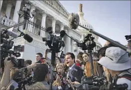  ?? Drew Angerer Getty Images ?? REP. MATT GAETZ, center, is being characteri­zed as “evil,” “delusional” and a “Benedict Arnold” by Bakersfiel­d-area residents for leading the speaker’s ouster.