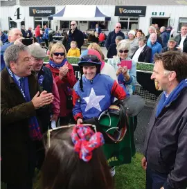  ?? HEALY RACING ?? Ellie Mac’s owner John Schuster (left) and connection­s with jockey Rachael Blackmore and trainer Henry de Bromhead (right) after the horse finished runner-up in yesterday’s Mares Novice Chase.at Listowel