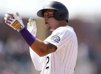  ?? David Zalubowski, The Associated Press ?? Rockies outfielder Yonathan Daza cheers after driving in two runs with a single off Royals relief pitcher Taylor Clarke in the seventh inning Sunday at Coors Field.