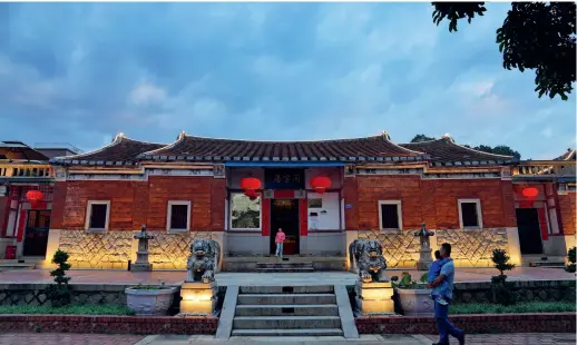  ?? ﬃYU JIEﬀ ?? Photo taken on 11 November 2023 shows a renovated traditiona­l residence in Lianhua Village, Xiamen, Fujian Province