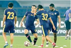  ??  ?? NorthEast United FC players at a training session at the Indira Gandhi Athletic Stadium in Guwahati on Thursday.