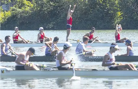  ?? JULIE JOCSAK/POSTMEDIA NEWS ?? Brandan Andrews, Alex Powell, Noah Van Helvert, Owen Voelkner, Eric Buchanan, Taylor Ashwood, Zach Whiteley, Mack Berkhout and coxswain Aurora Gordon of the St. Catharines Rowing Club celebrate after winning the senior mens lightweigh­t eight during the...