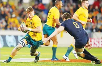  ??  ?? Pace to burn: Wallaby openside turned No.8 back row Sean McMahon