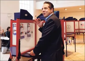  ?? Richard Drew / Associated Press ?? In this Nov. 6, 2018 file photo, New York Gov. Andrew Cuomo pauses as he marks his ballot, at the Presbyteri­an Church of Mount Kisco, in Mt. Kisco, N.Y. New York’s attorney general has promised a thorough investigat­ion of allegation­s that Cuomo sexually harassed at least two women.