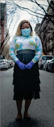  ?? AP PHOTO BY MARSHALL RITZELL ?? Tiffany Pinckney poses for a portrait in the Harlem neighborho­od of New York on April 1. After a period of quarantine at home separated from her children, she has recovered from COVID-19. Pinckney became one of the nations first donors of “convalesce­nt plasma.” Doctors around the world are dusting off a century-old treatment for infections: Infusions of blood plasma teeming with immune molecules that helped survivors beat the new coronaviru­s.