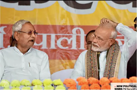  ??  ?? NEW POLITICAL SIGNS PM Narendra Modi with Bihar CM Nitish Kumar