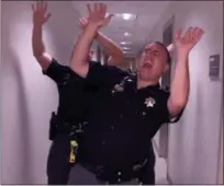  ??  ?? Members of the Ulster County Sheriff’s Office in a scene from the lip sync challenge video.