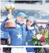  ?? PHOTO: GETTY IMAGES ?? Self Assured trainerdri­ver Mark Purdon and cotrainer Natalie Rasmussen celebrate winning the New Zealand Trotting Cup at Addington in Christchur­ch yesterday.