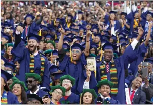  ?? JOSE LUIS MAGANA — THE ASSOCIATED PRESS ?? The near-total focus on low-income Black men by academia and popular culture creates an unrealisti­c picture of them. Here, at commenceme­nt at Howard University in 2016, students heard from thenPresid­ent Barack Obama.
