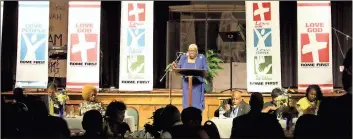  ?? / Spencer Lahr ?? Freedom Fund Banquet organizer Sara Dahlice Malone speaks during the annual fundraiser held at Rome First United Methodist Church on Saturday night.