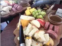  ?? COURTESY OF TEHACHAPI WINE & CATTLE COMPANY ?? Pair your favorite wine with cheese and fruit platters at Tehachapi Wine & Cattle Company.