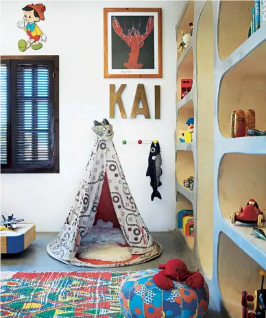  ??  ?? ABOVE Kai used to carry a cuddly toy lobster around with him as a toddler. ‘Our beach trips would end with us rescuing lobsters from the fate of cooking pots.’ Emma and her builders designed the shelves (top left) to display Kai’s toys, spanning...