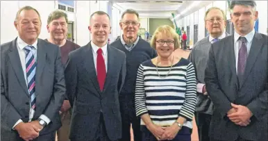  ??  ?? The new board of trustees of Ashford Leisure Trust, from left, chairman Ian Bull, Cllr Philip Sims, David Waterfield, David Hill, Linda Dodds, Ian Kirkland and Charlie Vavasour