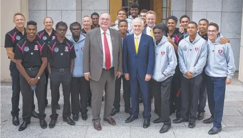  ?? Picture: SAHLAN HAYES ?? MEETING, GREETING: Prime Minister Malcolm Turnbull, Leichhardt MP Warren Entsch and Indigenous Affairs Minister Nigel Scullion, with students from Cape York House during their Canberra visit.