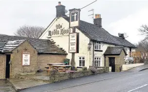 ??  ?? Suzanne and Robert Price are landlords at the only pub in Rainow, the Robin Hood, which is under threat after a massive hike in business rates