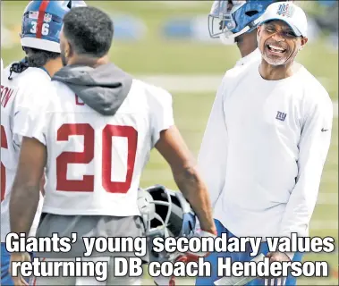  ?? Noah K. Murray ?? STAYING POWER: Giants assistant Jerome Henderson (right) made the transition from Joe Judge’s staff to working under Brian Daboll, with whom he worked on the staffs of the Jets and Browns.