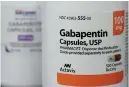 ?? AP Photo/Jeff Chiu ?? ■ Gabapentin is seen Thursday at Daniel's Pharmacy in San Francisco. The 25-yearold non-opioid pain drug is one of the most prescribed medication­s in the U.S., ranking ninth over 2017, according to prescripti­on tracker GoodRx. Researcher­s attribute the...