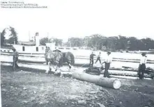  ?? SPECIAL TO THE EXAMINER ?? A glimpse of the past when logs floated down the water is pictured where the restaurant Mainstreet Landing now stands in Buckhorn.