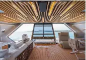  ??  ?? Hydraulica­lly-controlled aft doors allow the saloon to open out onto the transom