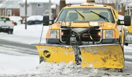  ?? APRIL GAMIZ/THE MORNING CALL ?? City plow trucks clear streets Jan. 16 in Bethlehem. Snow is again in the forecast in the Lehigh Valley.