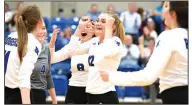  ?? NWA Democrat-Gazette/J.T. WAMPLER ?? The Rogers squad celebrates a point against Springdale on Tuesday.