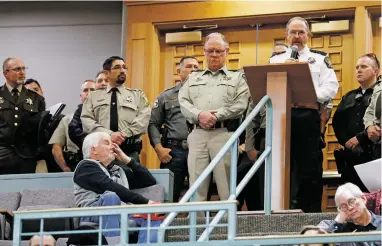  ?? LUIS SÁNCHEZ SATURNO/THE NEW MEXICAN ?? Sierra County Sheriff Glenn Hamilton testifies against a proposed gun law before the Senate Public Affairs Committee on Tuesday. The committee hearing for the contentiou­s bill was held in the Senate chamber, with members of the public in the gallery.