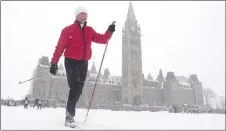  ?? CP PHOTO ?? Sen. Nancy Greene Raine skies around the front lawn of the Parliament buildings during an event promoting the National Health and Fitness day.