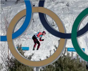  ?? AP ?? Dario Cologna competes during the men’s 15km freestyle cross-country skiing competitio­n. —