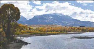  ?? The Associated Press ?? PUBLIC USE FOR PUBLIC LANDS: Emigrant Peak is seen on Oct. 8, 2018, rising above the Paradise Valley and the Yellowston­e River near Emigrant, Mont. The Trump administra­tion has put a conservati­ve advocate who argues for selling off the nation’s public lands in charge of the nation’s 250 million public acres. Interior Secretary David Bernhardt on Monday signed an order making William Perry Pendley acting head of the Bureau of Land Management, putting the lawyer and Wyoming native in charge of public lands and their resources.