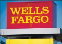  ?? JIM WATSON — AFP/GETTY IMAGES ?? New legislatio­n would offer free bank accounts to all California­ns. But Wells Fargo and Bank of America, for example, already offer essentiall­y the same services for $5 a month.