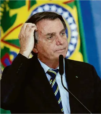  ?? Sergio Lima/AFP ?? O presidente Jair Bolsonaro em cerimônia do Planalto nesta quarta-feira (12)