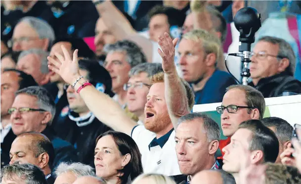 ?? PHOTO: REUTERS ?? An emotional Prince Harry, left, and a stoic Prince William watch England slide to defeat against Wales at Twickenham.