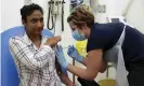  ?? Photograph: AP ?? A volunteer is injected during the first human trials in the UK to test a potential coronaviru­s vaccine.