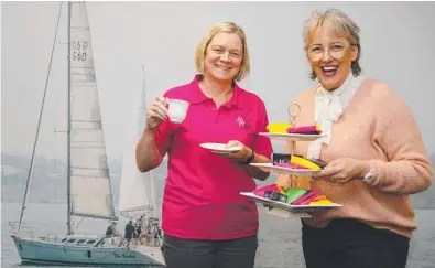  ?? ?? DigniTea high tea co-ordinator Fiona Threlfall and MC Roxie Bennett. Picture: Alison Wynd