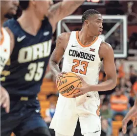  ?? MITCH ALCALA/FOR THE OKLAHOMAN ?? OSU freshman center Brandon Garrison (23) has averaged 6.6 points and 6.8 rebounds over his last eight games.