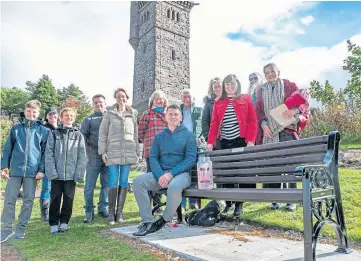  ?? ?? HONOURED: A bench in memory of Miss Laird – who was famed for handing out cola cubes to pupils – was erected atop Balmashann­er Hill. Picture by Kim Cessford.