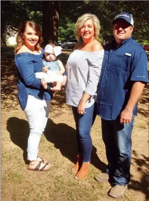  ?? PHOTOS BY CAROL ROLF/CONTRIBUTI­NG PHOTOGRAPH­ER ?? The Billy Kyle family of Augusta is the 2018 Woodruff County Farm Family of the Year. The family includes, from left, Brooklyn Browndervi­lle and her 1-year-old daughter, Atley Langford; and Nancy and Billy Kyle. Not shown are Kelby Bolling and her husband, John, and Sidney Browndervi­lle.